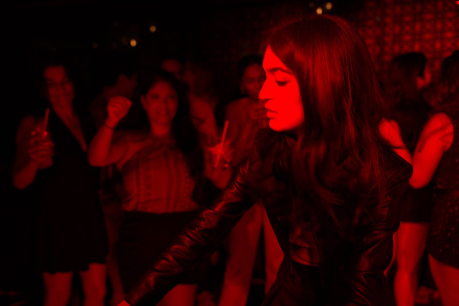 Guest dancing in red light